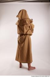 JOEL_ADAMSON STANDING POSE WITH SWORD AND CRUCIFIX